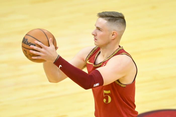 Mar 10, 2024; Cleveland, Ohio, USA; Cleveland Cavaliers guard Sam Merrill (5) shoots a three-point basket in the third quarter against the Brooklyn Nets at Rocket Mortgage FieldHouse.